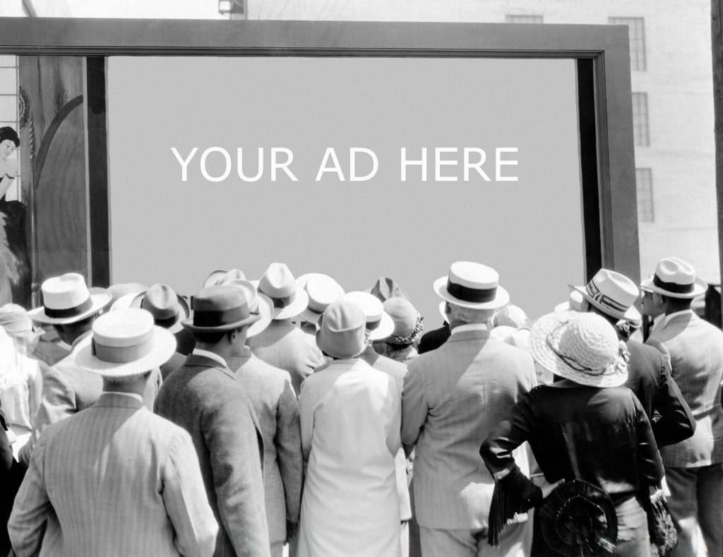 old photo with people looking at an ad
